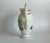 A beautiful French hard-paste porcelain coffee pot dating to circa 1820–1830, from the Restoration period. The elegant...