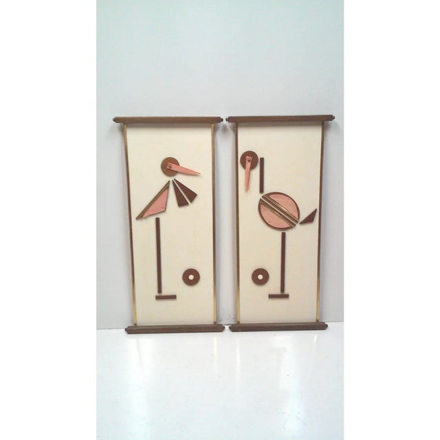 Mid-Century mixed media bird wall hangings comprised of geometric walnut wood pieces, felt and board. These cool...