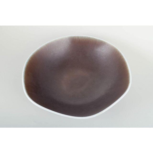 Berndt Friberg for Gustavsberg Studio Hand-thrown large bowl. Elegant hand-thrown stoneware bowl with characteristic brown...