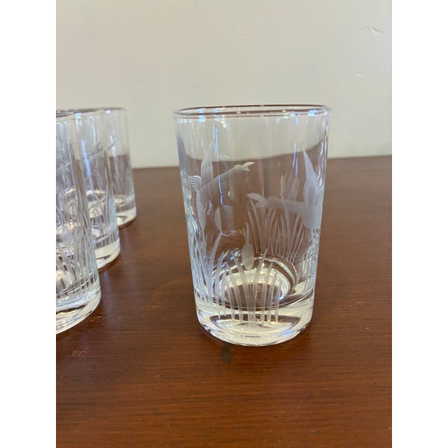 A charming set of six vintage Federal Glass etched tumblers, each decorated with elegant frosted waterfowl in flight among...
