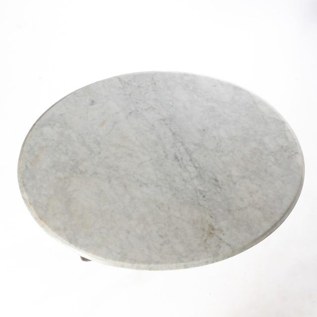 Oval Victorian Walnut Marble Top Table. Elegant design on the base. Small casters and top coming off allows for easier...