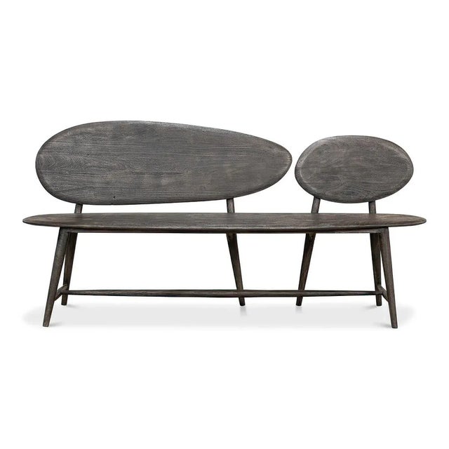 greyed wood bench. This bench has a flair for the arts and is inspired by boulders and pebbles found in natural...