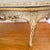 1940s French Provincial Style Kidney-Shaped 5 Leg Coffee Table With Inlaid Marquetry Top and Glass Overlay For Sale - Image 10 of 18