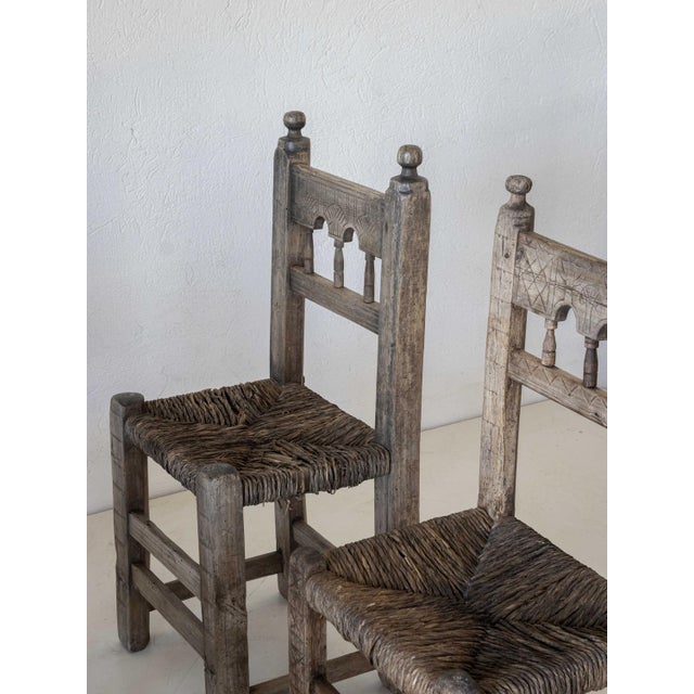 Set of four wonderful chairs from the French Pyrenees in poplar and stone pine dating back to the 18th century. The chairs...