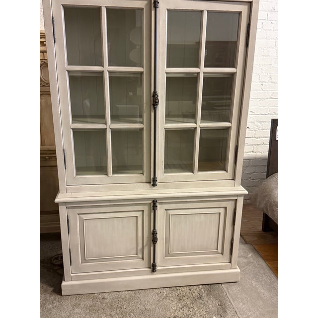Design Plus Gallery presents a Restoration Hardware French Casement Cabinet. This piece has classic casework, crown...