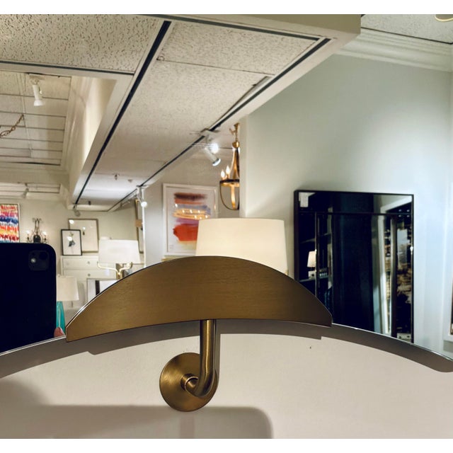 Stylish Revelation Modern Antique Brass Ahead of the Curve Wall Mirror, showroom floor sample