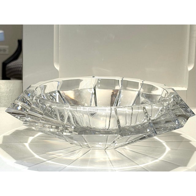 Exquisite Orrefors faceted crystal centerpiece bowl measuring 11” in diameter. Signed & numbered on the bottom, as well as...