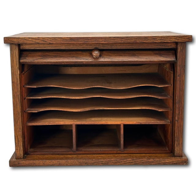 This is a great looking and very unusual antique American oak table top or desktop roll front file cabinet. Circa...
