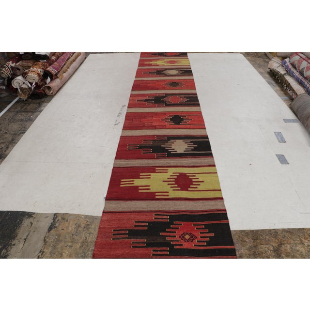 Flat Woven In High-Quality Wool Originating From Turkey Between 1930-1940, This Vintage Sivas Kilim Rug Blends A Tasteful,...