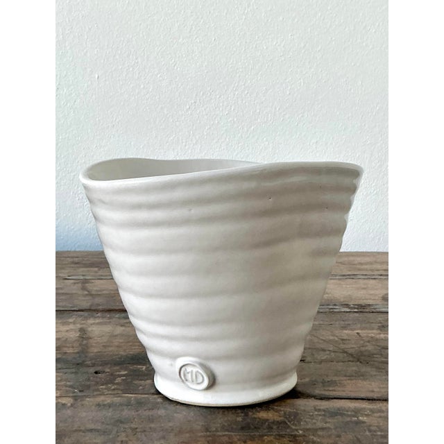 This sophisticated studio pottery vase by Montes Doggett is a masterful example of contemporary artisanal design....