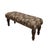 Meticulously handcrafted in the United Kingdom, this upholstered stool boasts classic studding and hand-polished solid...