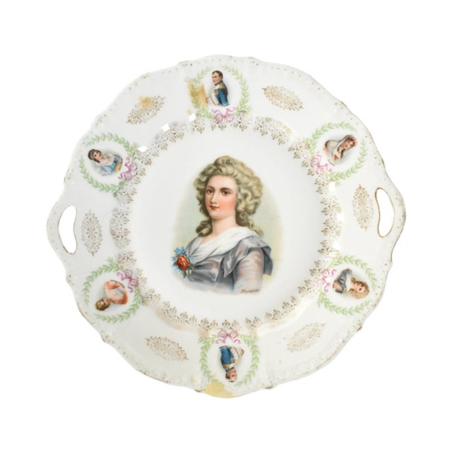 An antique German porcelain portrait plate with border medallions of Napoleon, Joesphine, Hortense, Mme Recamier, and...