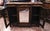 Cupboard, servante, inlaid with movable central mirror framed by turned columns tints ebony and two glass doors to destroy...