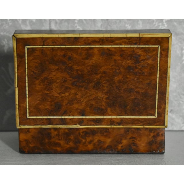 Vintage (1940's) Box has an English - Traditional Style. Made of Wood. BurlWood. Inlaid Wood. The Measurements: 7.75"W x...