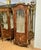 Make a statement with this grand French Louis XV-style display cabinet, crafted from solid, heavy wood and richly...