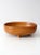 This vintage mid-century footed wooden bowl features a warm wood tone and timeless shape that works beautifully as a...
