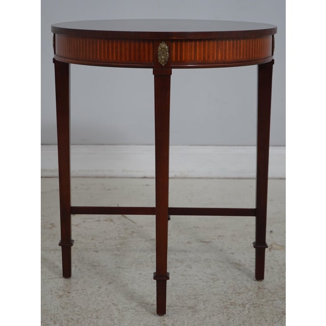 Age: Approx. 30 Years Old Details: Nice Reddish Mahogany Finish Brass Ormolu Mounts Quality Construction Nice Inlay Work...