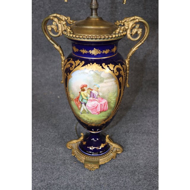 This impressive pair of French Sèvres-style porcelain vases, dating to the turn of the nineteenth and twentieth centuries...