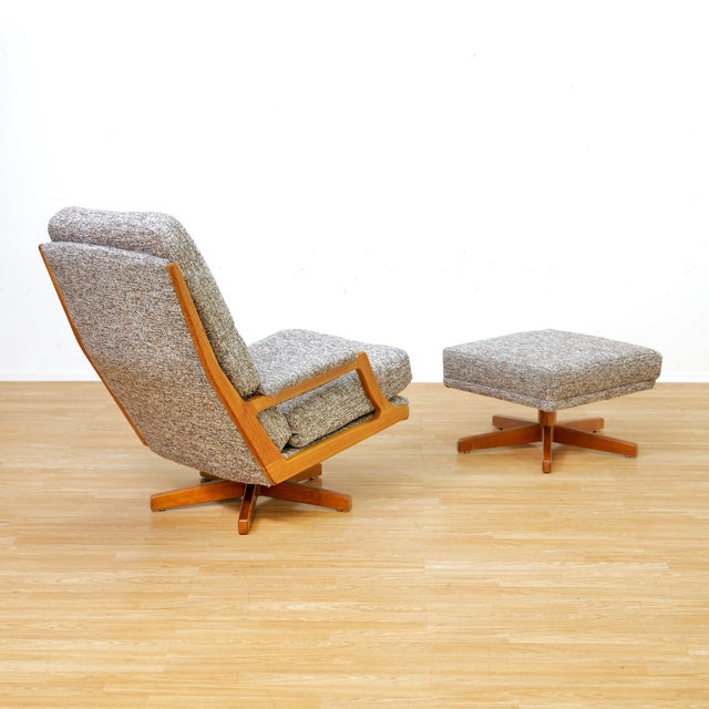Vintage swivel lounge chair and ottoman produced in Denmark during the 1960s. This classy danish design lounge chair is...