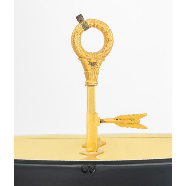French Style Gilt Metal Bouillotte Lamp, with two candlestick form bulb fittings and black tole peinte shade. 27.5" H x...