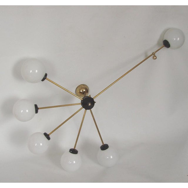 Vintage Brass and Glass Chandelier from Stilnovo, 1960s, in Very Good conditions. Designed 1960 to 1969 Up to 250V...