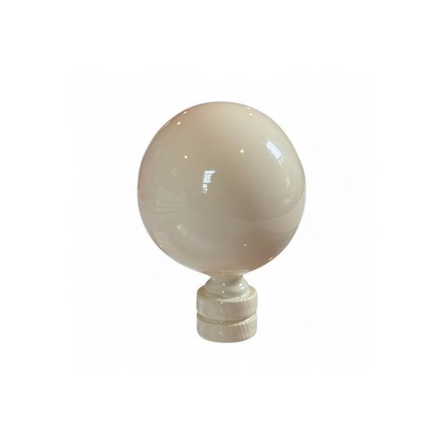 This hand-lacquered lamp finial by Dressing Rooms Interiors Studio features a high-gloss Maison Blanc finish designed to...