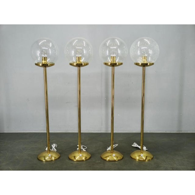 Exceptional set of four space age floor lamps by kamenický šenov, produced in czechoslovakia during the 1970s. The lamps...