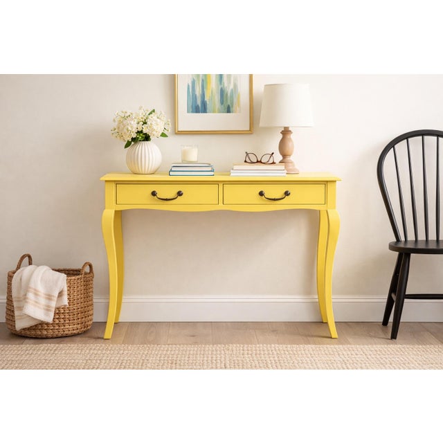 Striking French Provincial writing desk or bedside table, refinished in a bold canary yellow with updated dark bronze...
