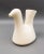 Josephine Baker Jean Varoqueaux Vintage White Ceramic Pottery Pitcher. Measures approximately 7 3/4" long, 5" wide, 7 3/4"...