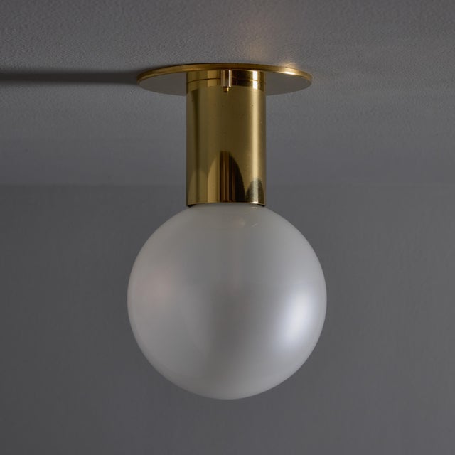 1970s Motoko Ishii Opaline Glass and Metal Ceiling or Wall Light for Staff Leuchten Executed in brass-plated metal and...