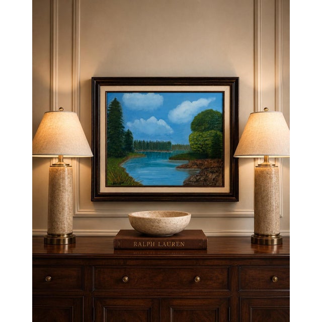 Bring timeless tranquility into your home with this original oil on canvas landscape painting, signed J. Brown and dated...