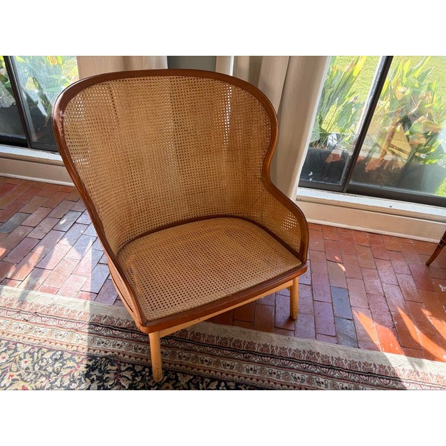Garsnas "Dandy" lounge chair designed by Pierre Sindre (designed 2017), made in Sweden by Gärsnäs. Cane backrest edged in...