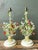 This charming pair of vintage tole table lamps captures the whimsical elegance of mid-20th-century decorative lighting....