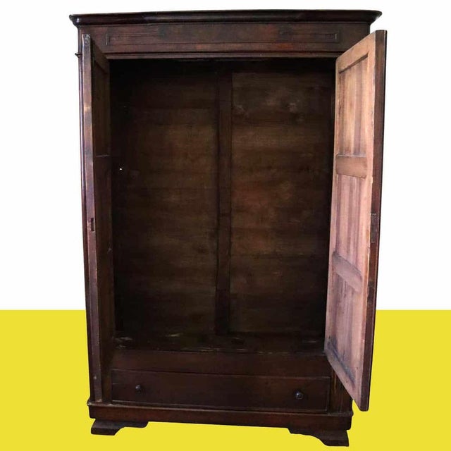 vintage wooden wardrobe Height: 208 Width: 140 Depth: 51 This piece is attributed to the mentioned designer/maker. It has...