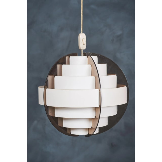 Beautiful retro pendant light, designed by Flemming Brylle, Preben Jacobsen, Space Age style, provides a pleasant effect....