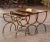 Elegant and sculptural, this set of three antique French nesting tables combines graceful Art Deco lines with neoclassical...