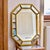 A stunning, large, beveled mirror with a giltwood frame and octagonal shape. This piece combines classic elegance with Art...
