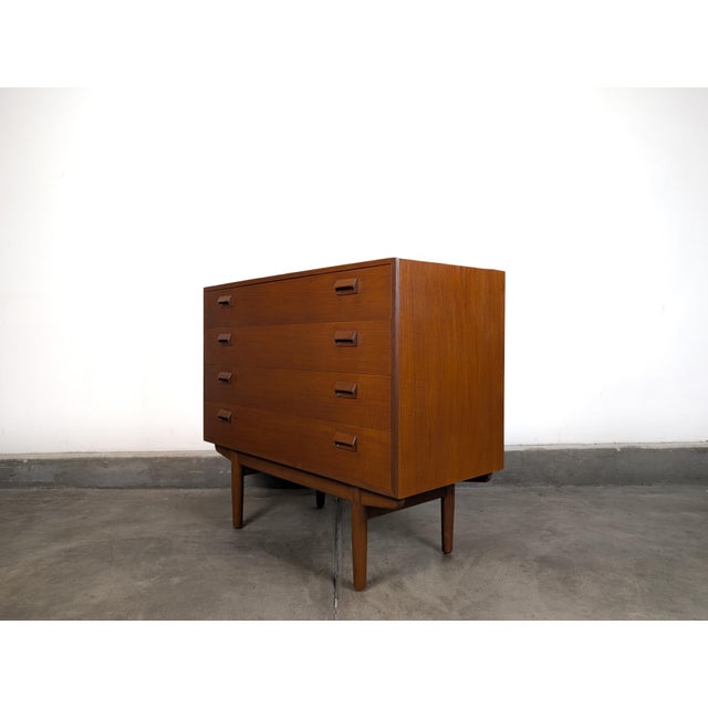 An exceptional example of Danish mid-century modern design, this four-drawer teak chest was designed by Børge Mogensen for...