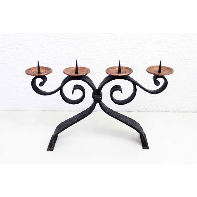 Beautiful wrought iron candlestick from the 1950s. Very well made, this candle stick combines strength and finesse at the...