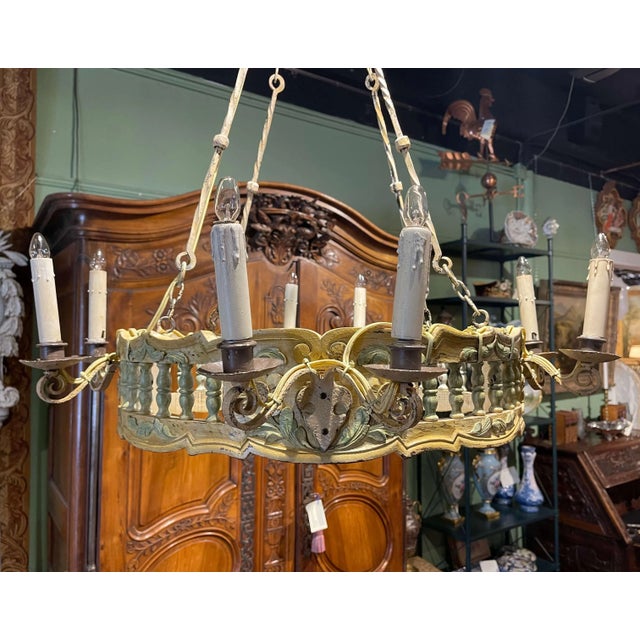 Full of Provençal charm and character, this antique Louis XV style chandelier features a beautifully carved openwork...