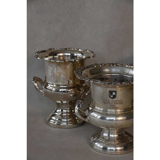 A trophy urn is a decorative vessel traditionally awarded as a prize or commemorative piece, most often in English...