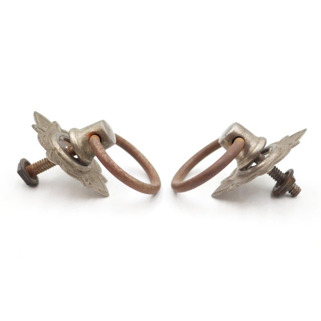 Victorian style ring drawer pulls made of brass back plates and steel rings. Mounting hardware is included. Good condition...