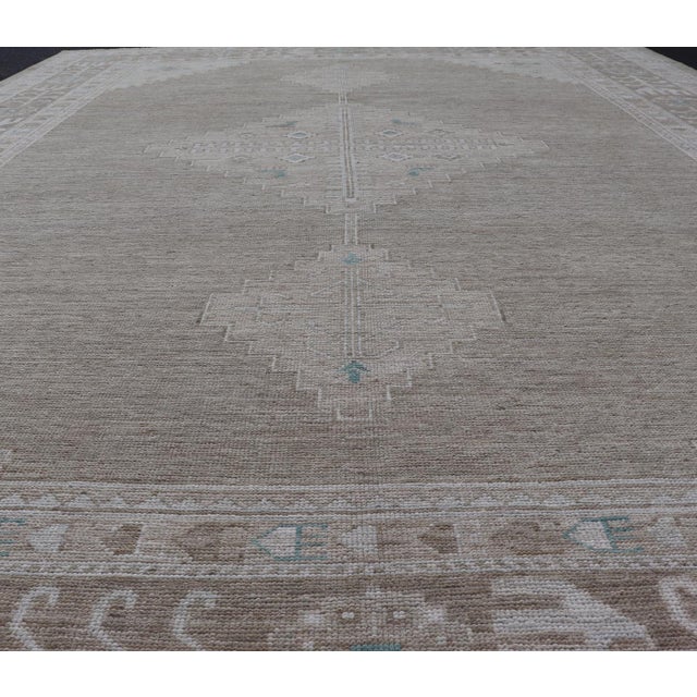 Tribal Oushak Rug With a Taupe Base and Soft Ivory, Light Blue Accents 10'0 X 14'4 For Sale - Image 3 of 12