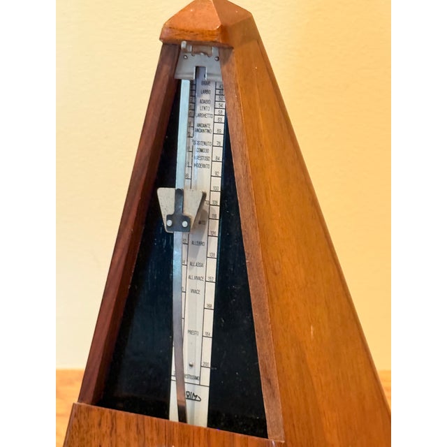 This Vintage Prim metronome made in Czechoslovakia has an adjustable swing, a winding key and a very beautiful lacquer...