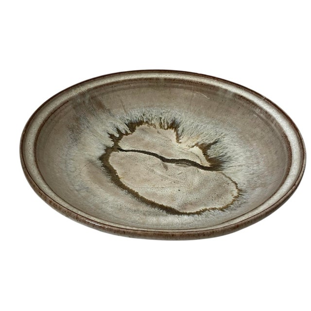 The Marguerite Rost Studio Ceramic Serving Bowl is a vintage original piece of art pottery from California, showcasing a...