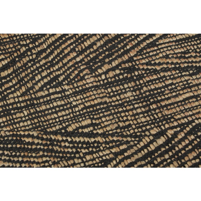 Handwoven in jute, this 2x3 contemporary gift-sized rug joins Rug & Kilim’s Modern collection. The design presents a...
