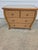 This chest has ample storage, great for a guest room. It comes with a glass inlay, for protection. The basket weave wicker...