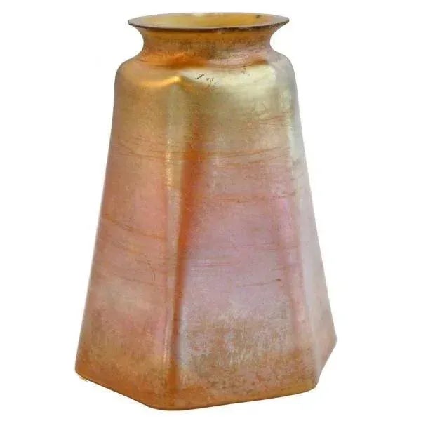 An antique, late 19th century, signed Tiffany Studios lamp shade of hexagonal form in gold glass. MAKER Louis Comfort...