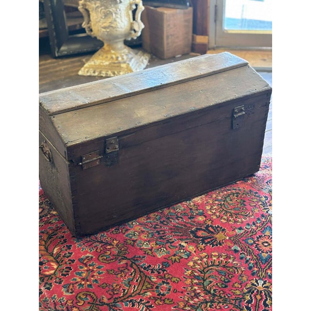 Primitive Wood Trunk with gorgeous patina and a partially flat top surface. Sides slope slightly. Dovetail joints. Wrought...