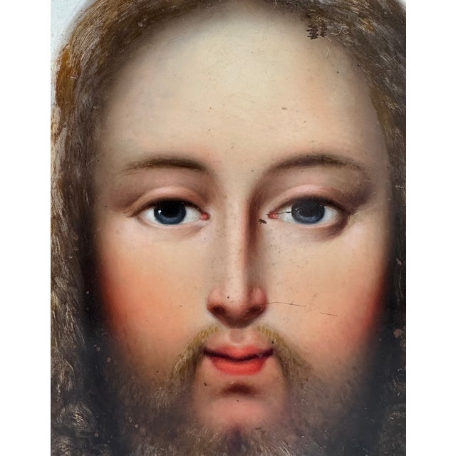 Oil on copper depicting the Holy Face of Christ against an ivory background, late 18th/early 19th century, later frame....